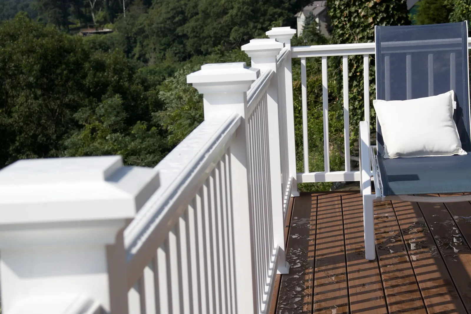 Composite deck lounge seating built by Riverstone Builders